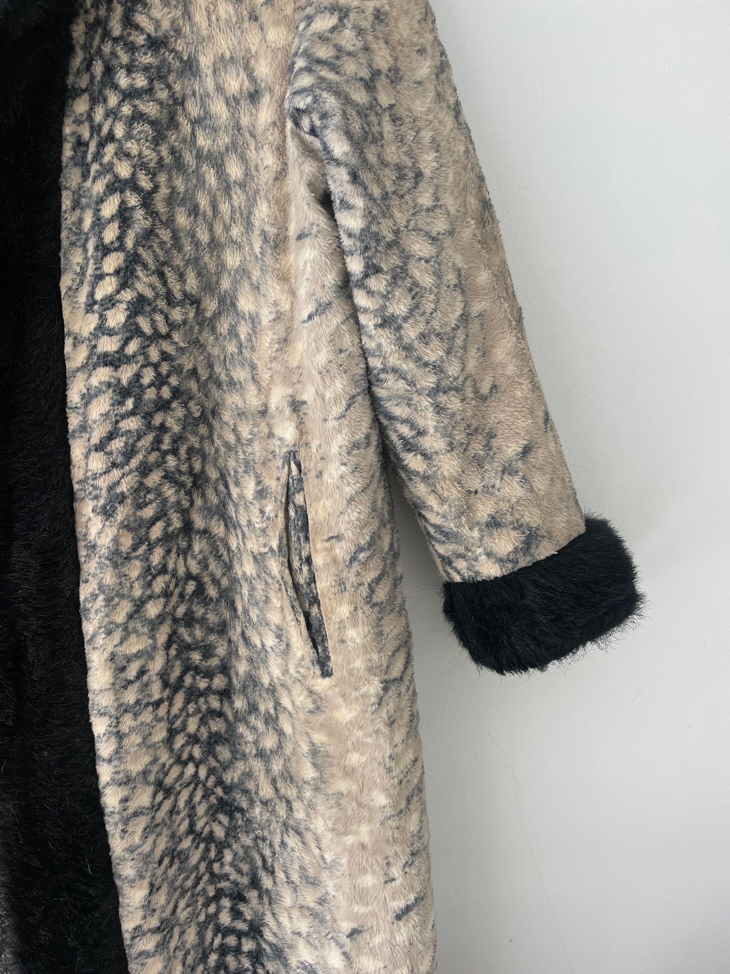 Reversible animal print coat.
