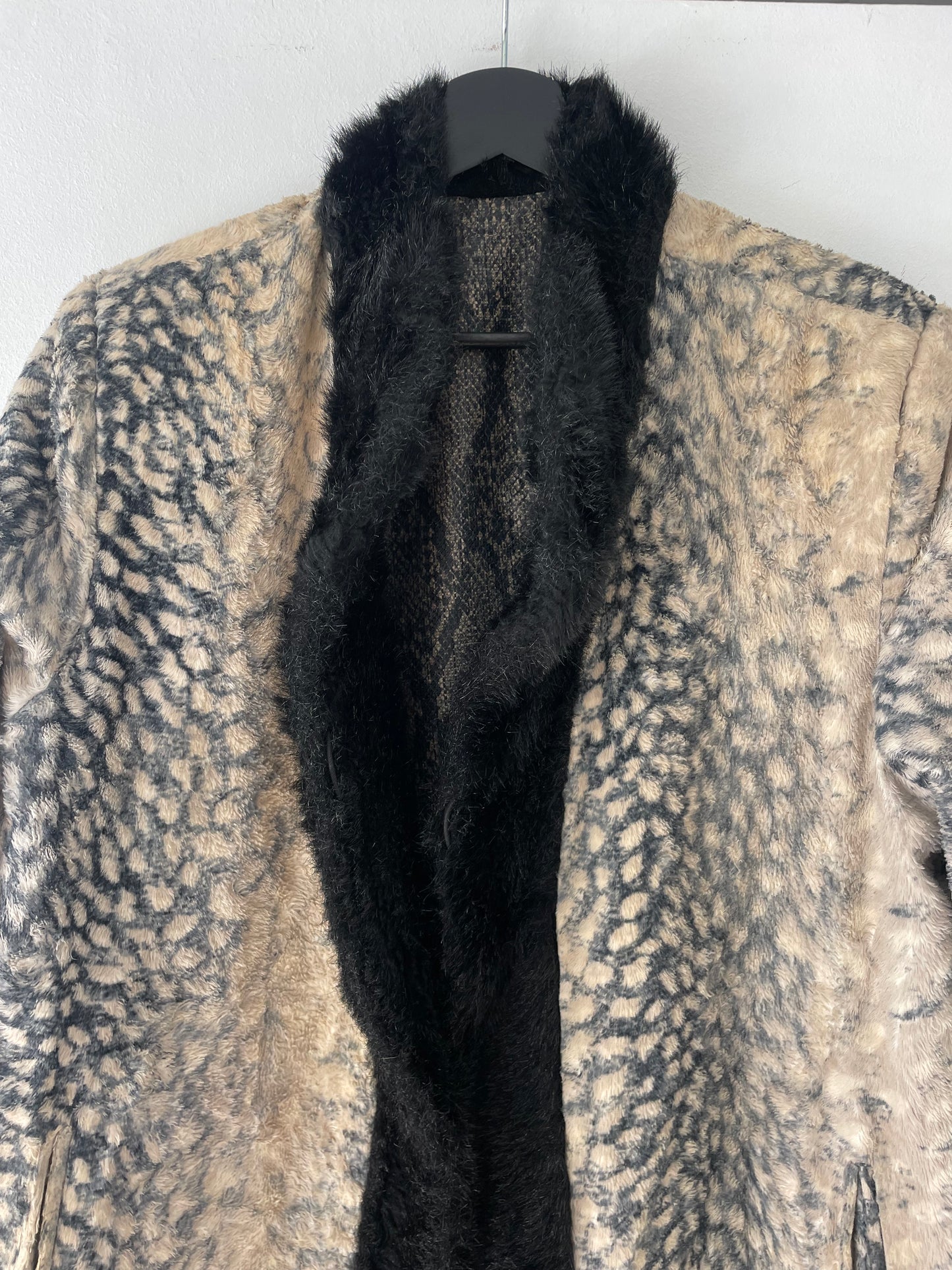 Reversible animal print coat.
