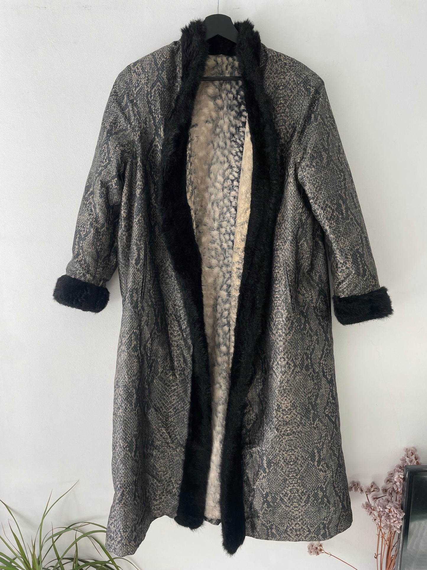 Reversible animal print coat.