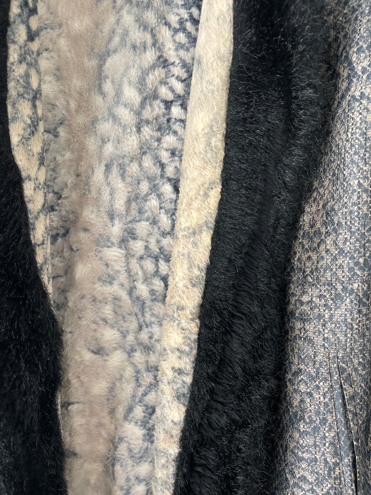 Reversible animal print coat.