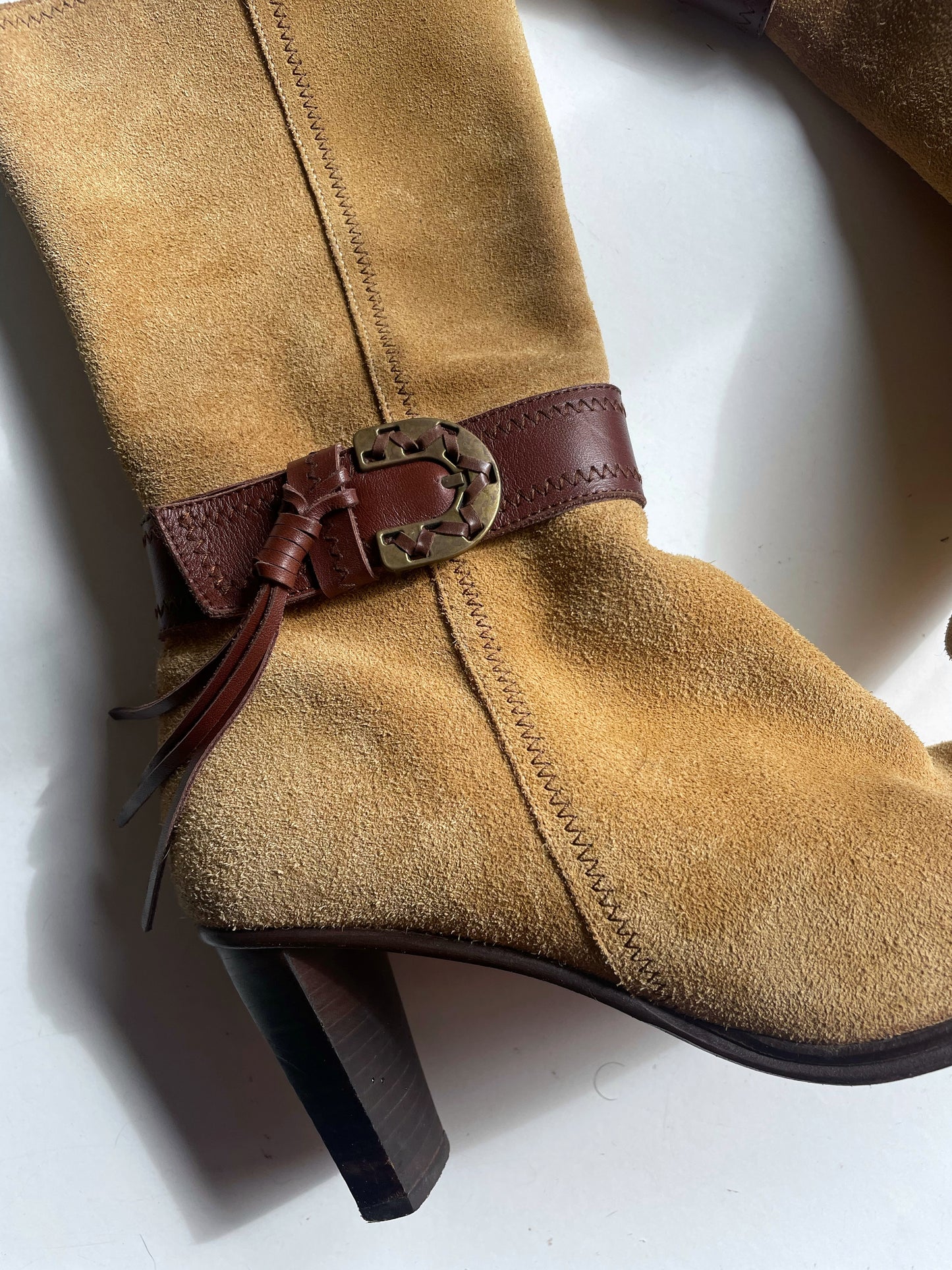 Suede cowboy style boots.
