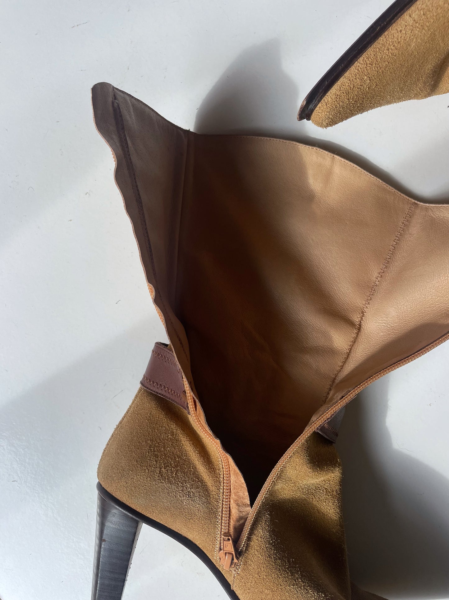 Suede cowboy style boots.