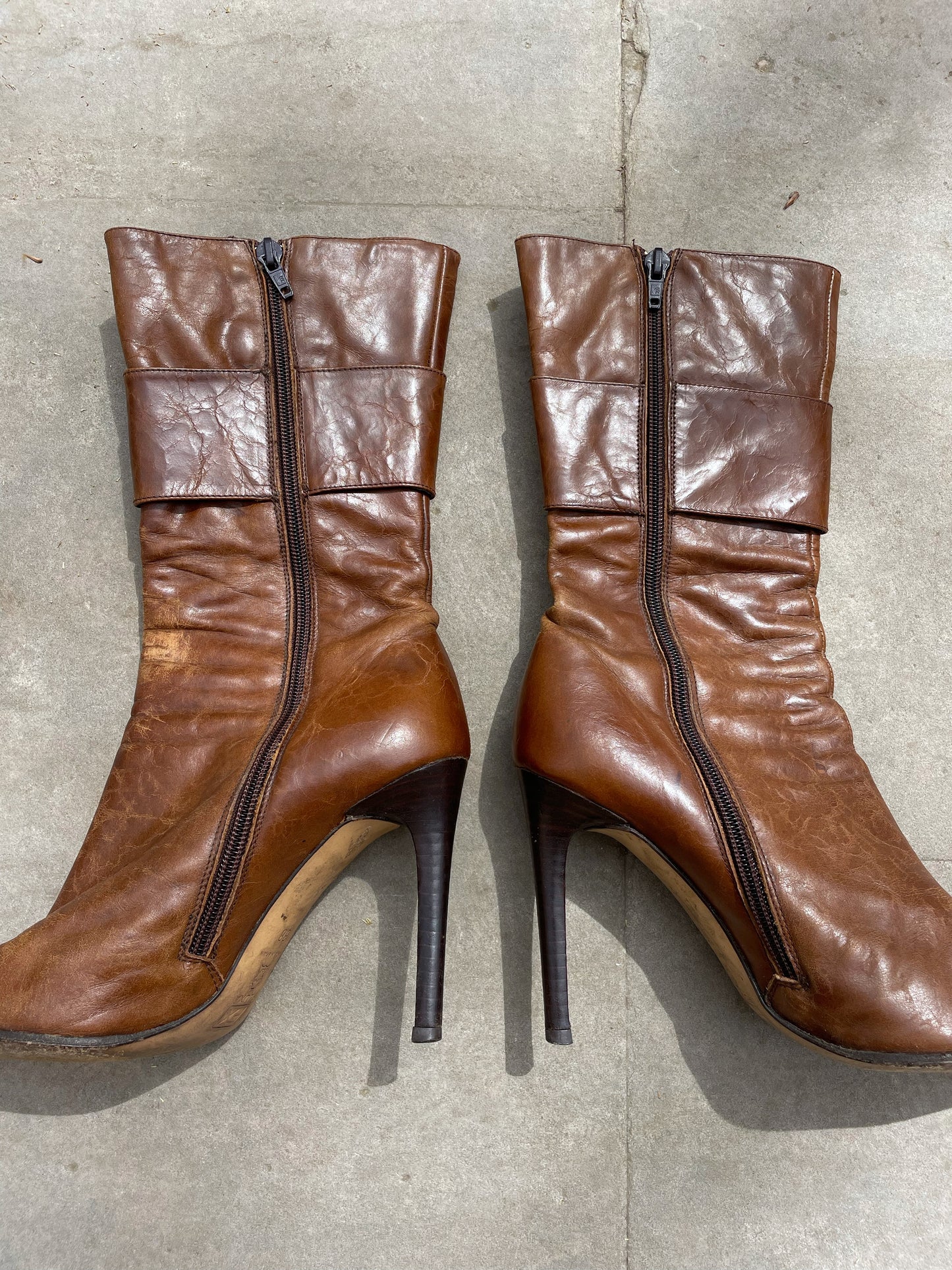 Buckled hight heel boots.