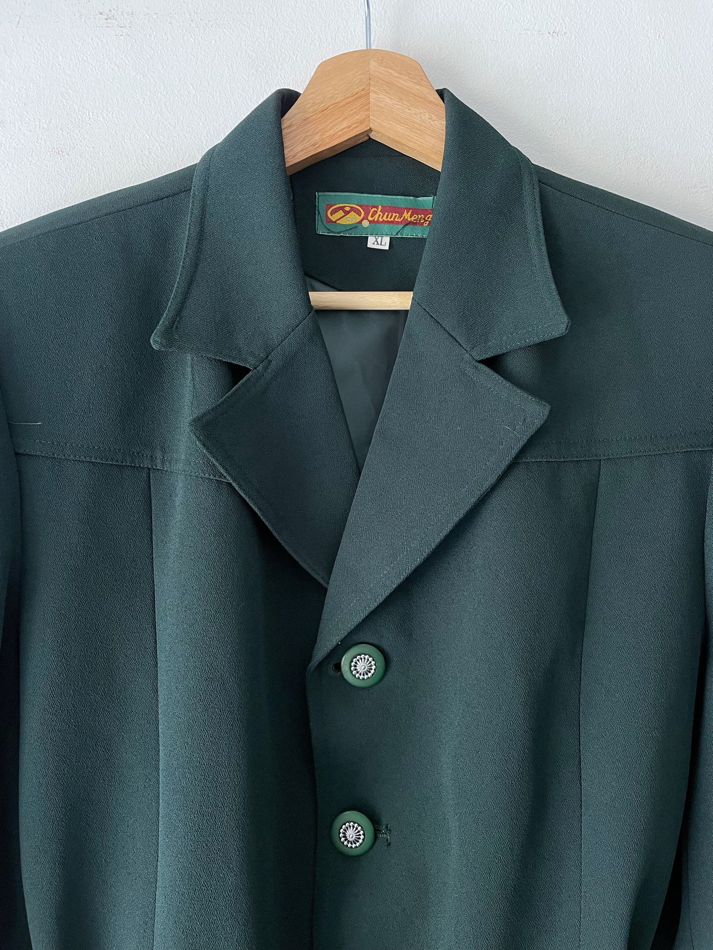 Blazer with a belt.