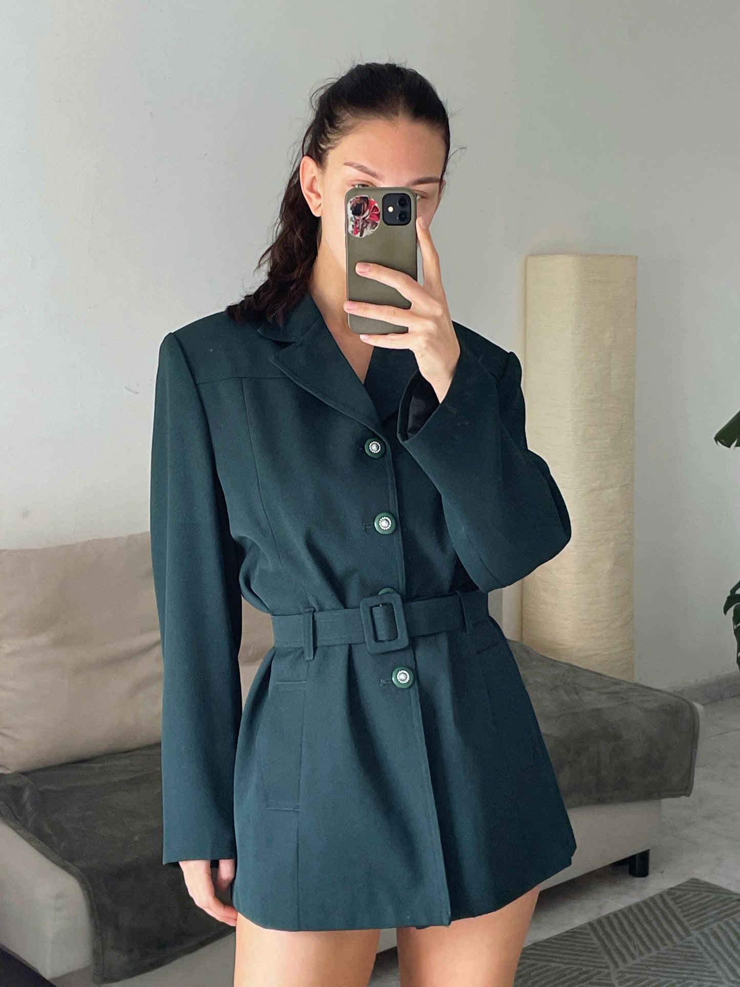 Blazer with a belt.