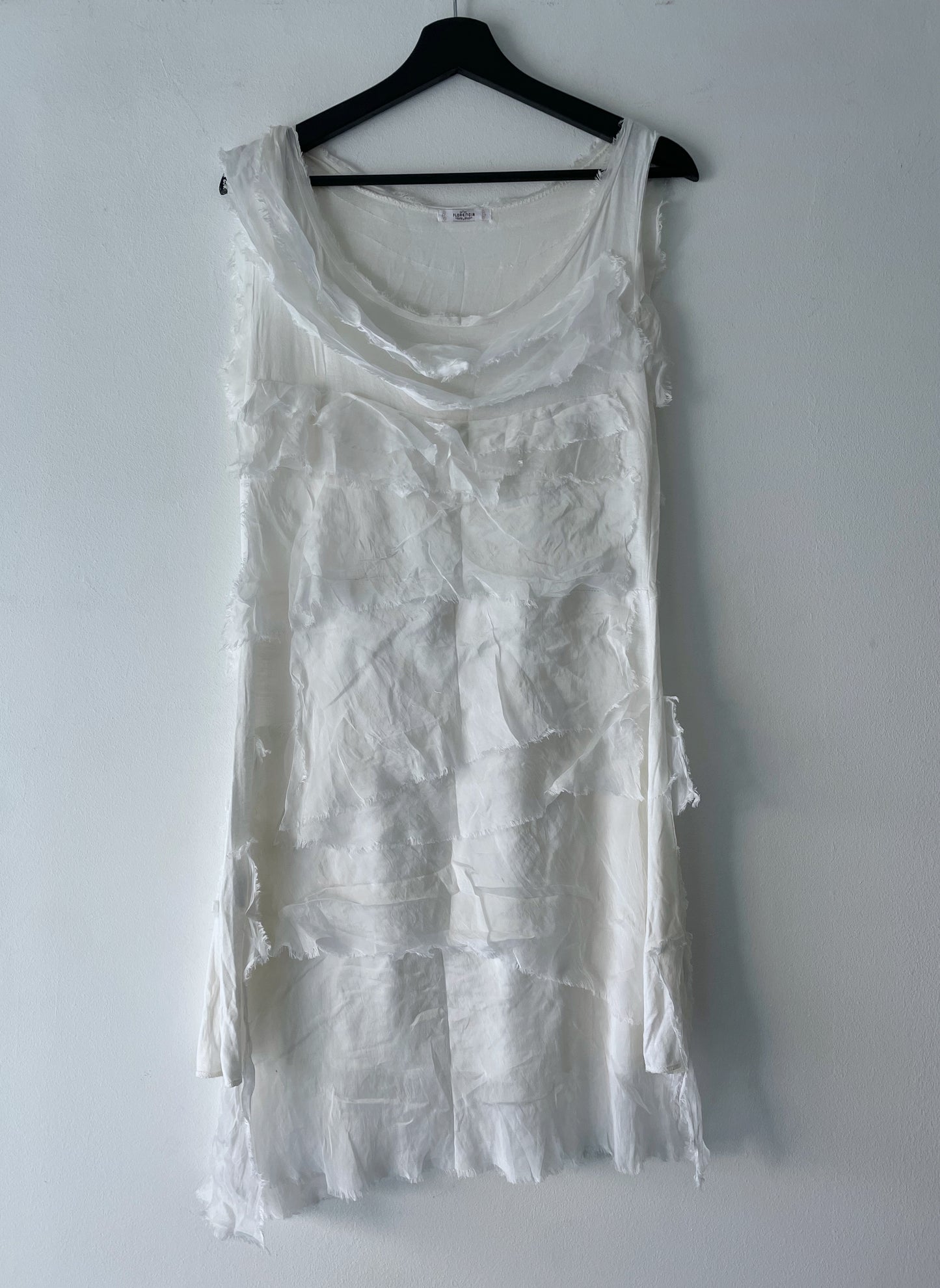 Silk dress with ruffles.