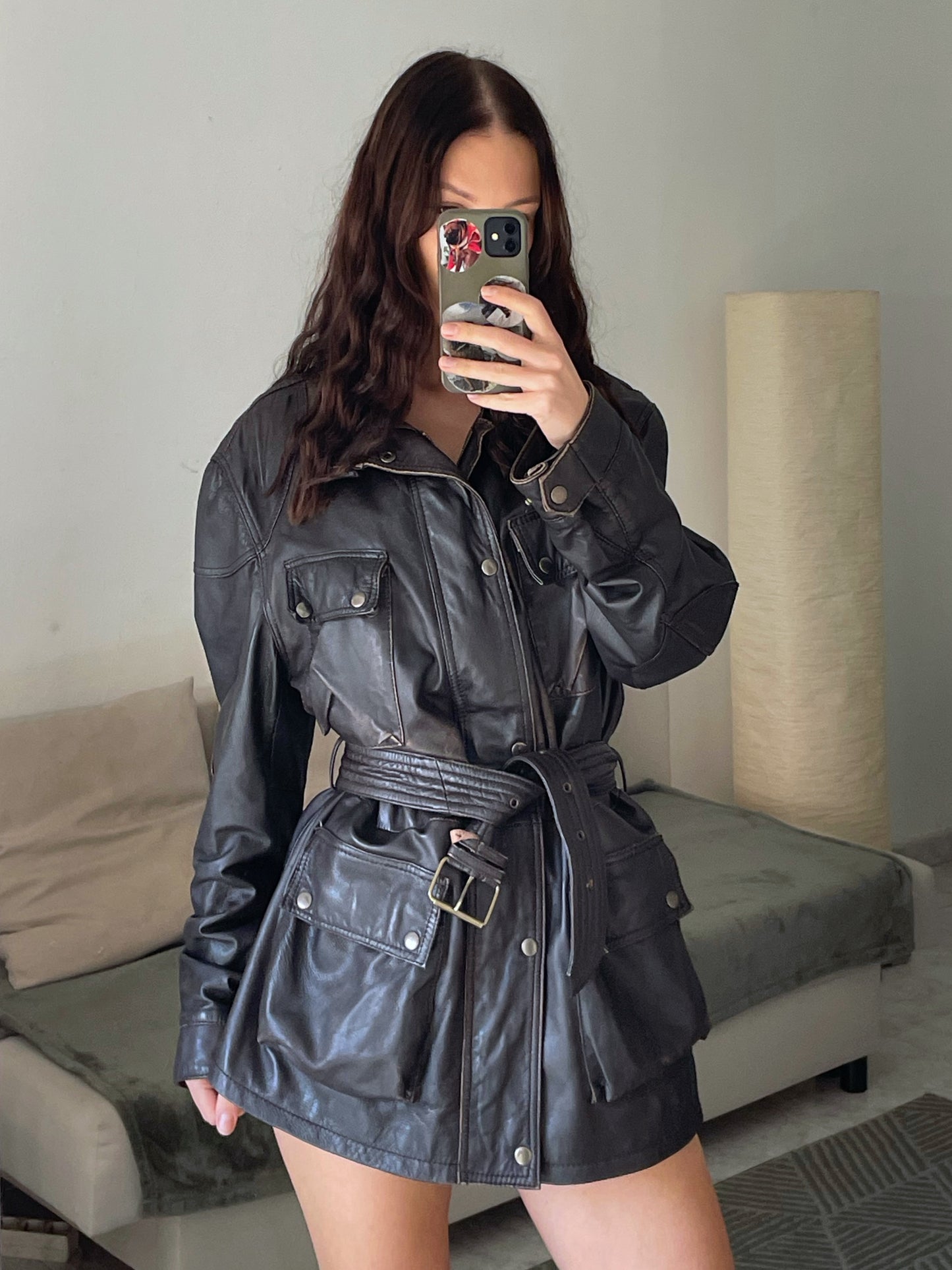 Leather jacket with a belt.