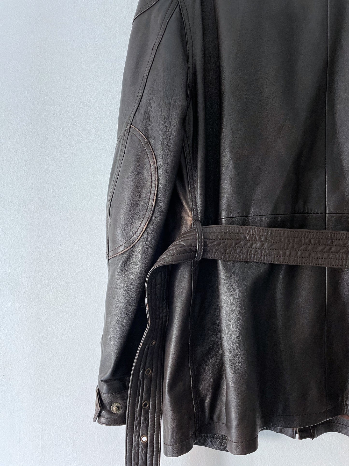 Leather jacket with a belt.