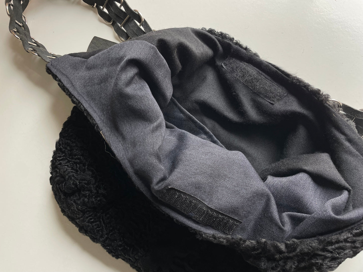 Karakul fur bag.