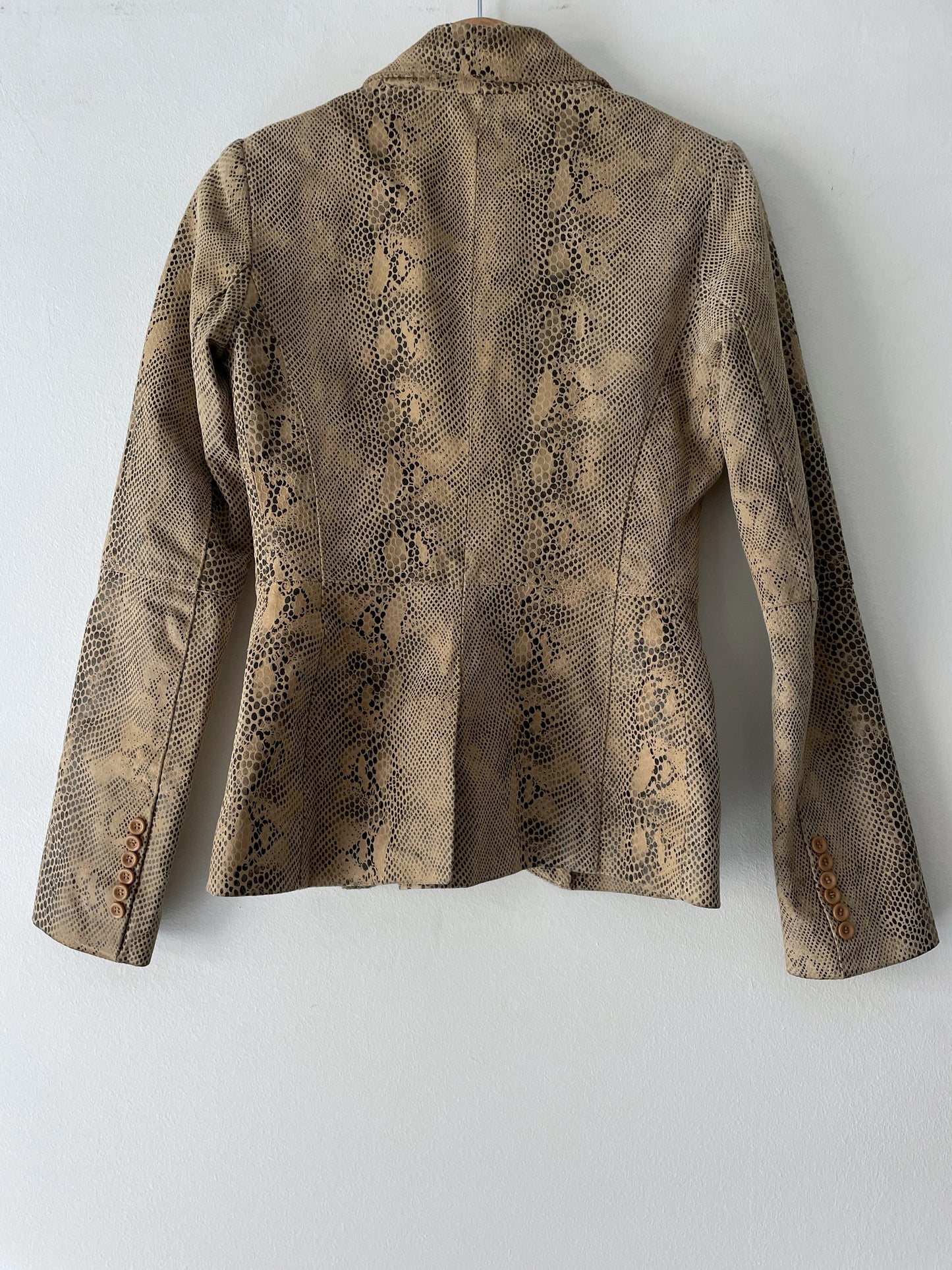 Snake skin print leather jacket.