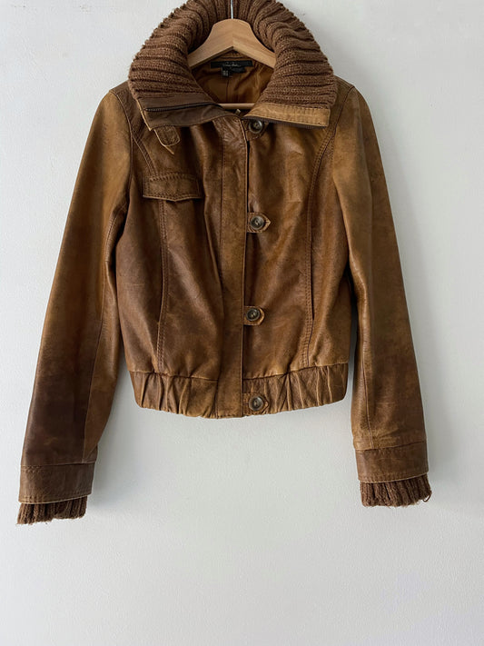 Y2K style natural leather jacket.