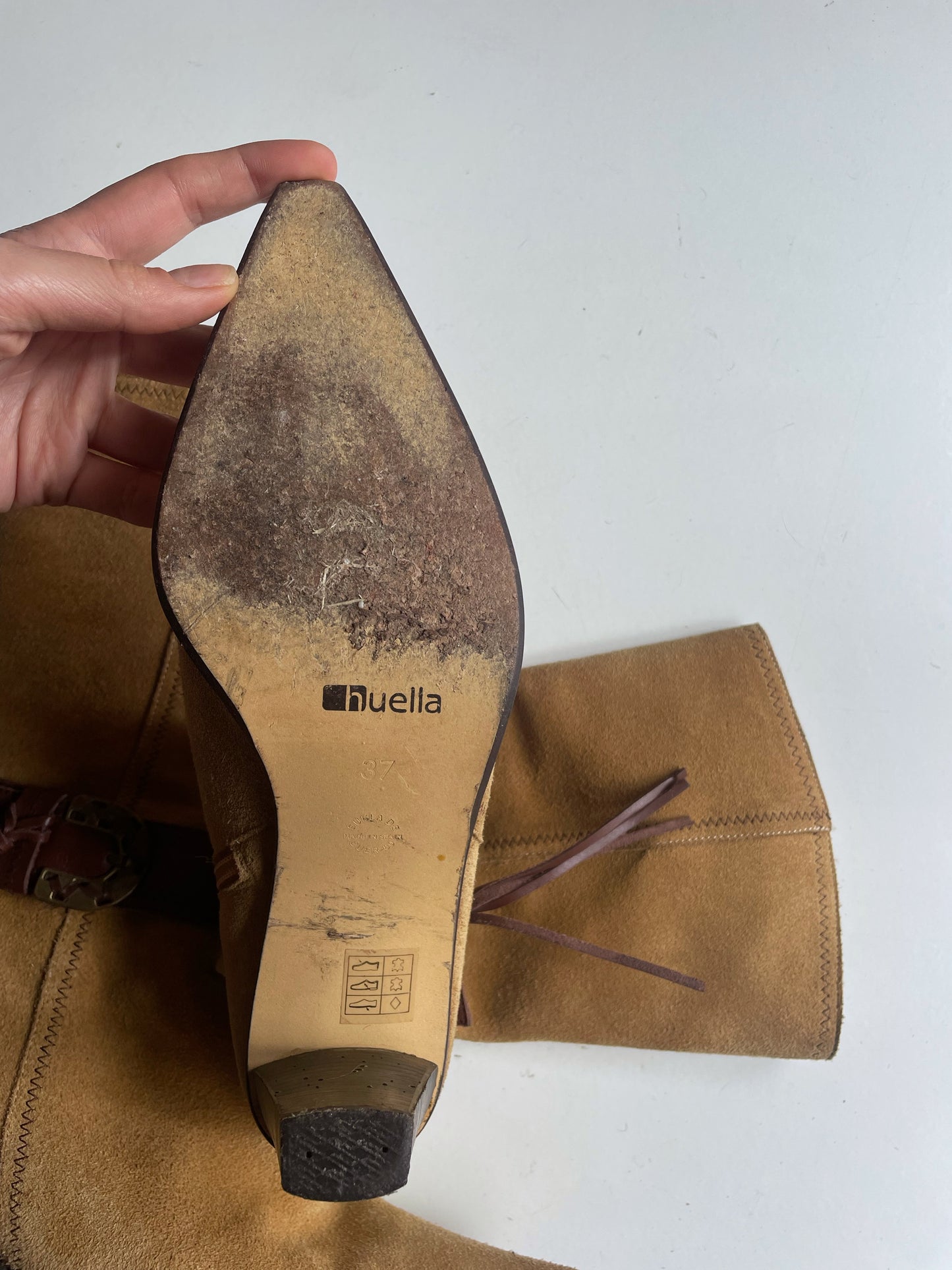 Suede cowboy style boots.