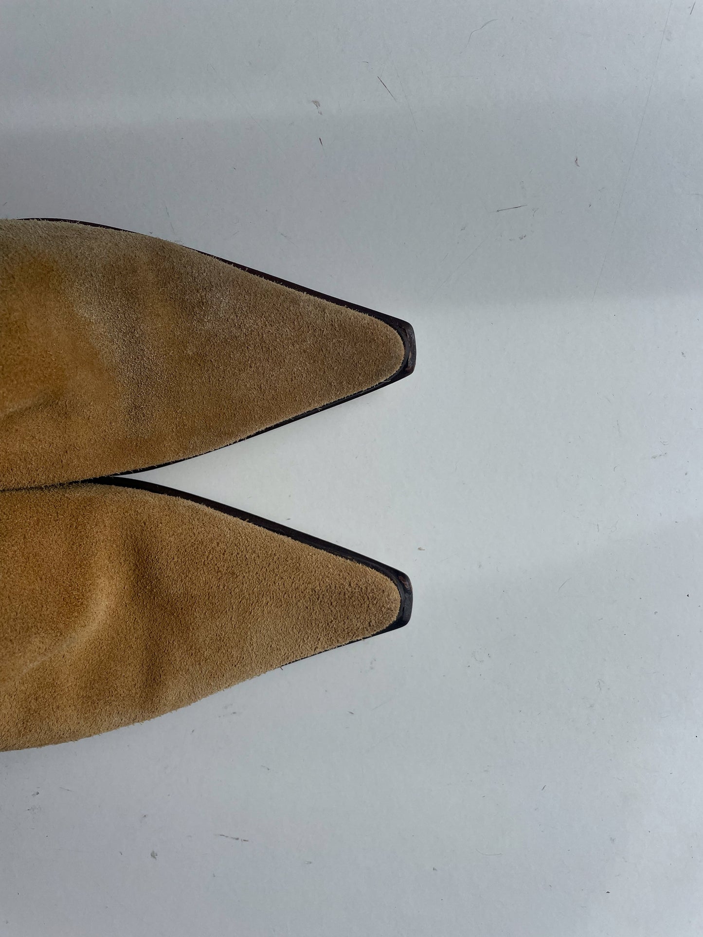 Suede cowboy style boots.