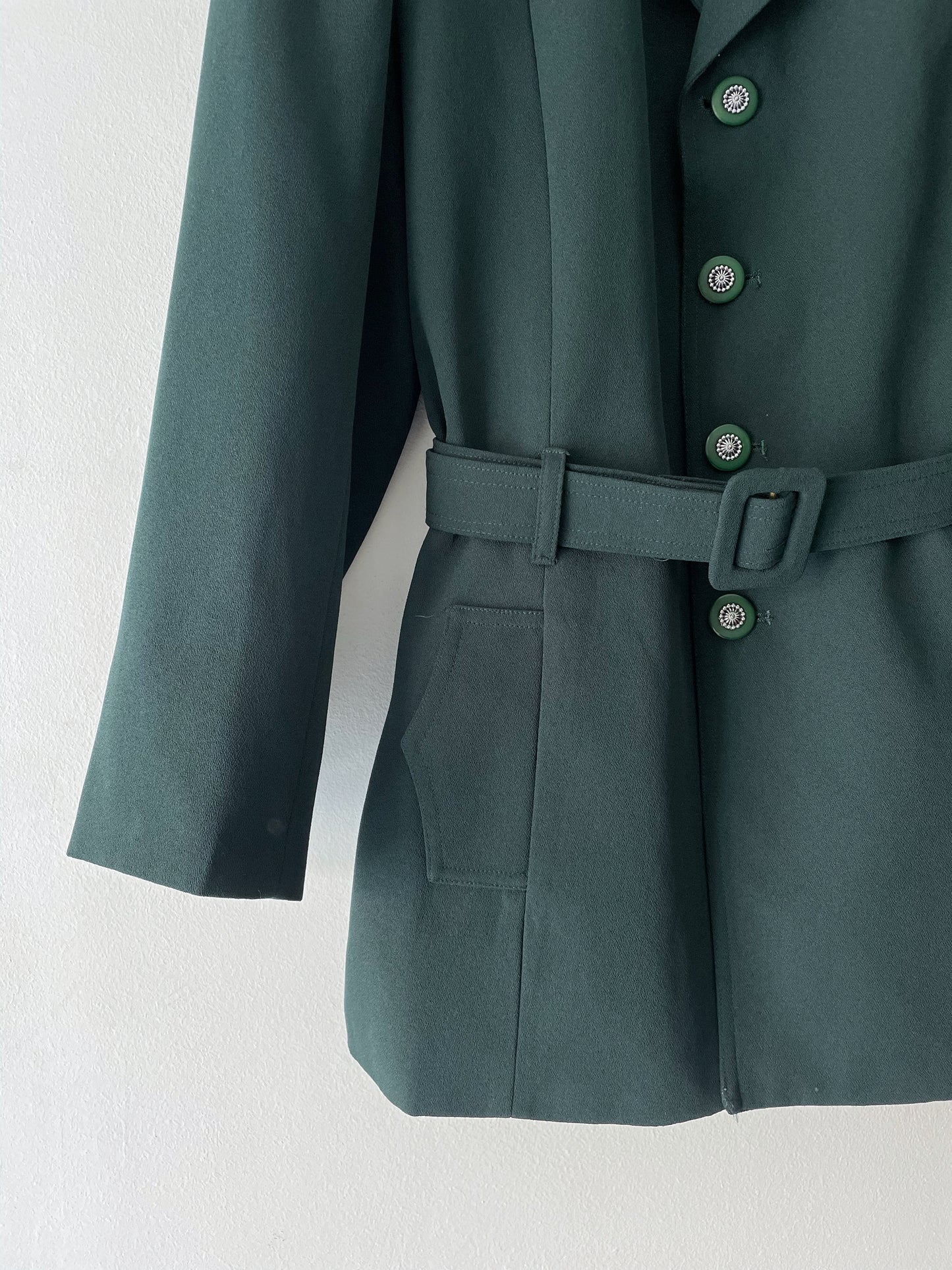 Blazer with a belt.