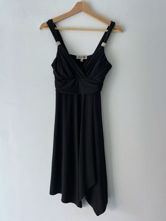 Mini black dress.